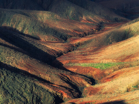 Eroded Hills and Dramatic Geological Formations in Rugged Landscape