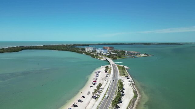 Keys off of the Florida coast are connected by thin strips of land and bridges making this a very windy way to get to a beauty end of the road. 