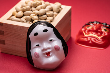 Cultural Japanese masks symbolizing good luck and evil removal