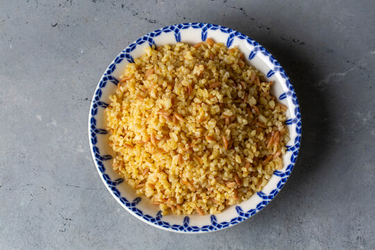 Traditional delicious Turkish food, bulgur pilaf with vermicelli (Turkish name; arpa sehriyeli bulgur pilavi)