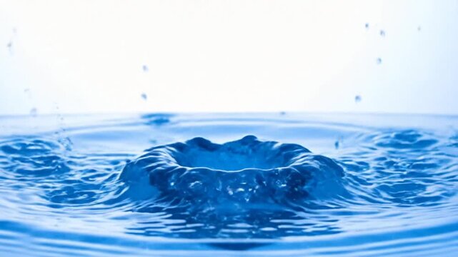 A vibrant capture showcasing a water droplet impact creating a crown shape surrounded by drops