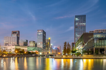 Fototapeta premium Ningbo, China: city skyline, architecture, landscape, city, metropolis, landmark, background, tourist destination, downtown, modern.