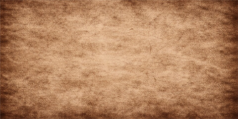 Fototapeta premium Antique aged brown parchment with a stained grunge texture provides a vintage blank page backdrop for retro design projects