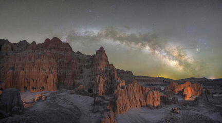 Milky Way Panorama over a jagged rock formation in Cathedral Gorge State Park Nevada 