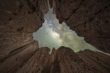 Milky Way Galaxy over a moon cave in Cathedral Gorge State Park Nevada 