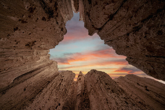 Looking up from within a Moon Cave crevasse at Cathedral Gorge State Park in Nevada 
