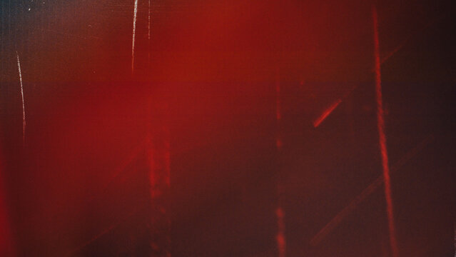 light leak overlay effect with scratch dust and blur red light,retro film texture flare ray lens on black background.abstract background with colorful glowing light,grunge old film burn light