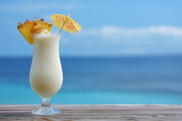 Refreshing Pineapple Milkshake with Fresh Fruit Garnish - Tropical Summer Beverage Delight