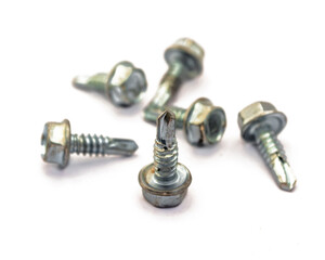 Stainless steel selftapping screws for truss steel construction. Isolated on a white background, selective focus