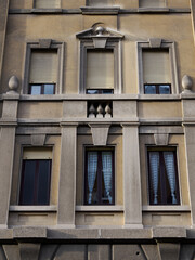Obraz premium Old residential buildings along via Leon Battista Alberti in Milan, Italy