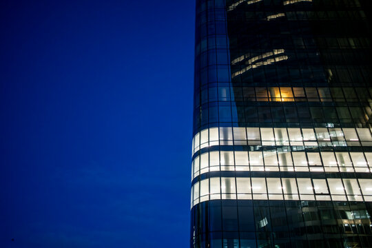 Minimal modern architecture skyscraper with glass office facade in paris under open sky with copyspace for branding and design background