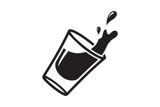 A dark liquid splashing out of a clear shot glass tilted on its side isolated on white background