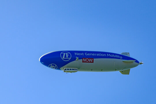 Immenstaad Deutschland - 28.08.2024:Zeppelin mit ZF Werbung am blauen ,wolkenlosen Himmel &uuml;ber dem Bodensee 