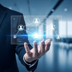 Fototapeta premium Modern business concept, visualizing a digital network of people and connections on a transparent screen held by a businessman