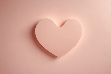 A pink heart shape on a soft pink background with gentle lighting