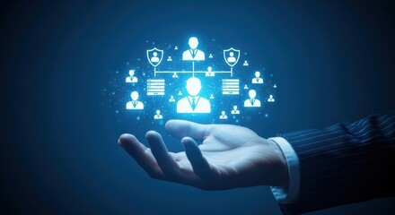Hand holding glowing digital human resources management network on a dark blue background