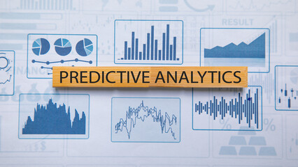 Predictive Analytics text with a financial graphs.