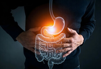 Man holding stomach as glowing digital illustration shows digestive system experiencing discomfort due to heartburn acid reflux