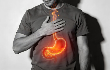 Burning stomach concept showing health problem with acid reflux burning pain and burning sensation near chest area