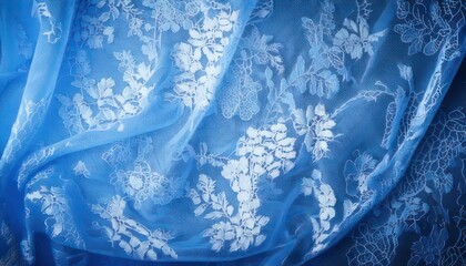 Elegant Blue Fabric with Floral Embroidery - A Delicate Textile Art.