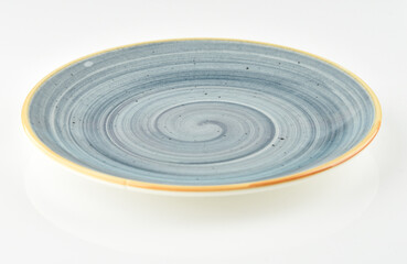 Empty plate isolated on a clean background. Minimal tableware concept for kitchen, dining and food presentation.