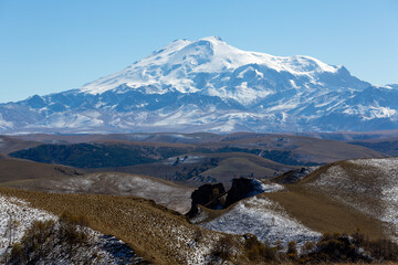 Panoramic view of the snow-capped mount Elbrus and foothills