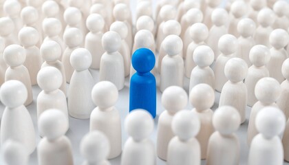 Single Blue Human Figure Standing Out in a Crowd of White Figures Representing Leadership and Individuality
