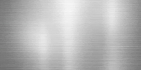 Industrial brushed metal plate texture featuring a polished silver steel surface with a shiny metallic pattern on a grey stainless aluminum sheet background