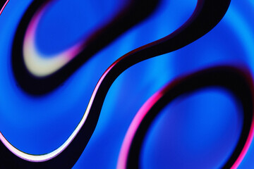 Abstract neon glowing warped concentric rings