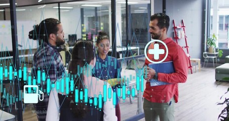 Financial data and healthcare icons over diverse business people discussing in office - Powered by Adobe