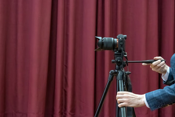 The camera is in the hands of the videographer. Video recording