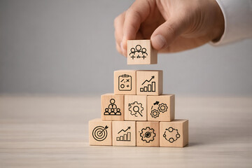 Building Strong Teams: Conceptual Human Resources & Team Management with Wooden Blocks Symbolizing Strategy, Growth, Leadership, and Collaboration.