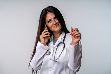 Woman, doctor and phone call with computer in clinic for medical results, appointment schedule or virtual advice.