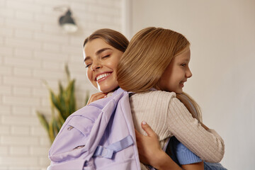 Mother and Daughter Hug Before School