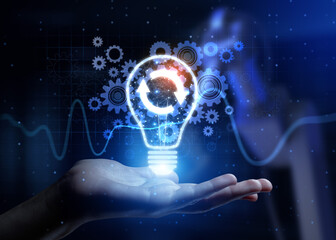 Update Ensuring Current Information and System Maintenance with Human Hand Holding Lamp Hologram.