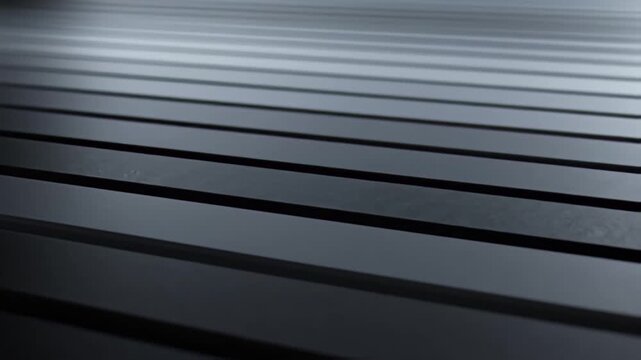 Abstract dark gray metallic linear pattern background for technology uses