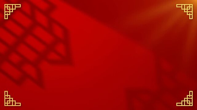 Vibrant red background with dynamic golden geometric patterns shining bright