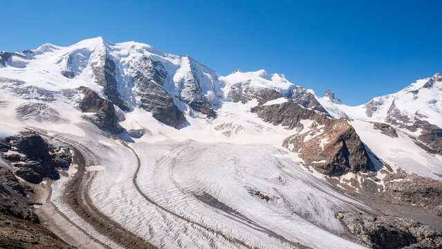 Panorama of Pers Glacier flowing beneath Bellavista in Bernina mountain range in the Swiss Alps, captured from Diavolezza in Engadin in summer