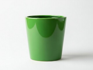 Bright green ceramic mug on white surface isolated on white background