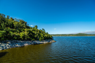 Fototapeta premium A calm lake with a mountain in the background
