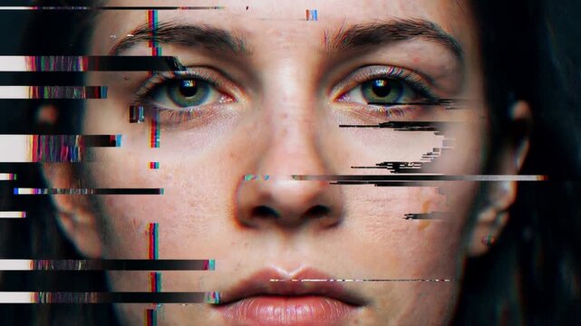 Distorted face of young woman with digital glitch effects. Close-up of female subject with horizontal data corruption and pixelated artifacts