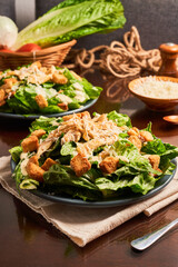 Classic caesar salad with grilled chicken fillet and parmesan cheese.