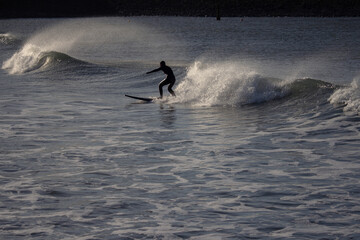 surfer in the waves in the UK