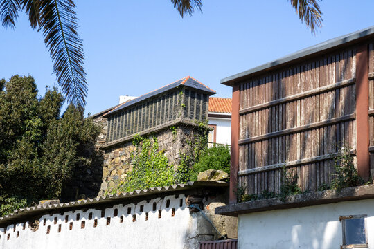 Ancient Galician granary (h&oacute;rreo) in San Andr&eacute;s de Teixido, Cedeira, A Coru&ntilde;a, Spain, overlooking the dramatic cliffs of the Serra da Capelada and Atlantic Ocean.