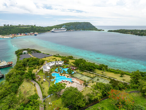 Aerial view of Iririki Island Resort nestled in the turquoise waters of Port Vila Harbour, where luxury meets tropical paradise, Port Vila, Shefa Province, Vanuatu.
