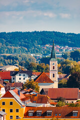Far view of the church of Winzer, Danube, Deggendorf, Bavaria, Germany with the Bavarian forest in the background