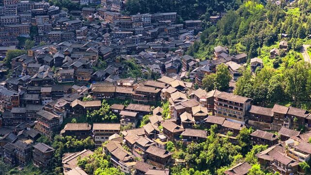 High angle view of traditional wooden houses in Xijiang Qianhu Miao Village, Guizhou, China.