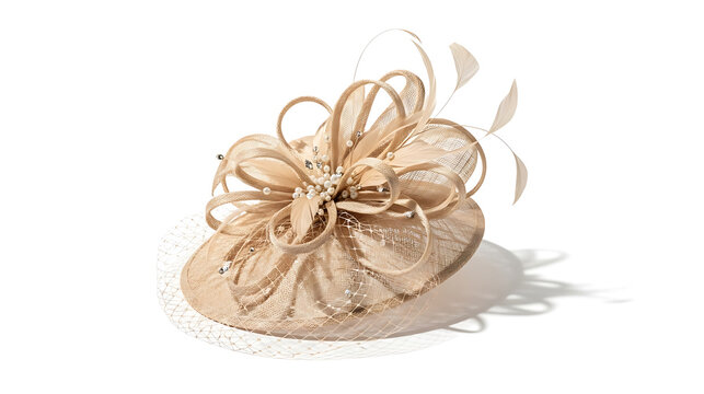Beautiful beige fascinator with netting, feathers, and beaded flowers, perfect for weddings and special occasions, isolated on white.