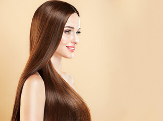 Obraz na płótnie Canvas Beautiful model girl with shiny brown and straight long hair . Keratin straightening . Treatment, care and spa procedures. Smooth hairstyle. 