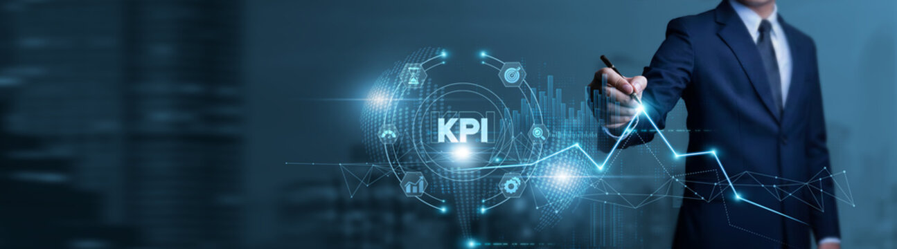 Businessman touches KPI data chart with pen and performs analysis on key performance indicators, business metrics, performance tracking, and operational insights.